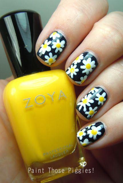 uñas negras diseño de flores