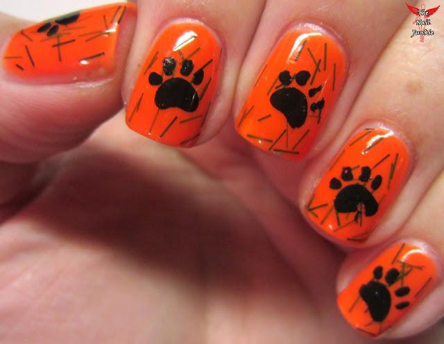 patas de perros en uñas