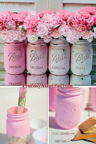 manualidad floreros con tarros pintados