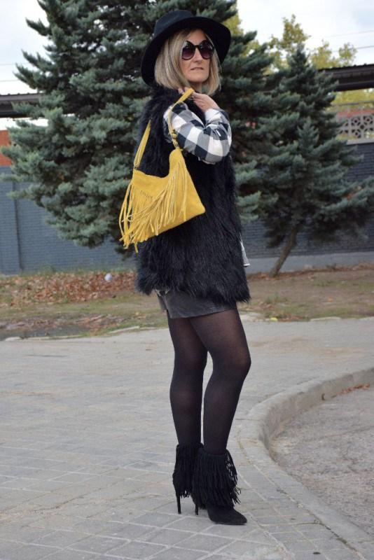 Faux fur vest and checked shirt