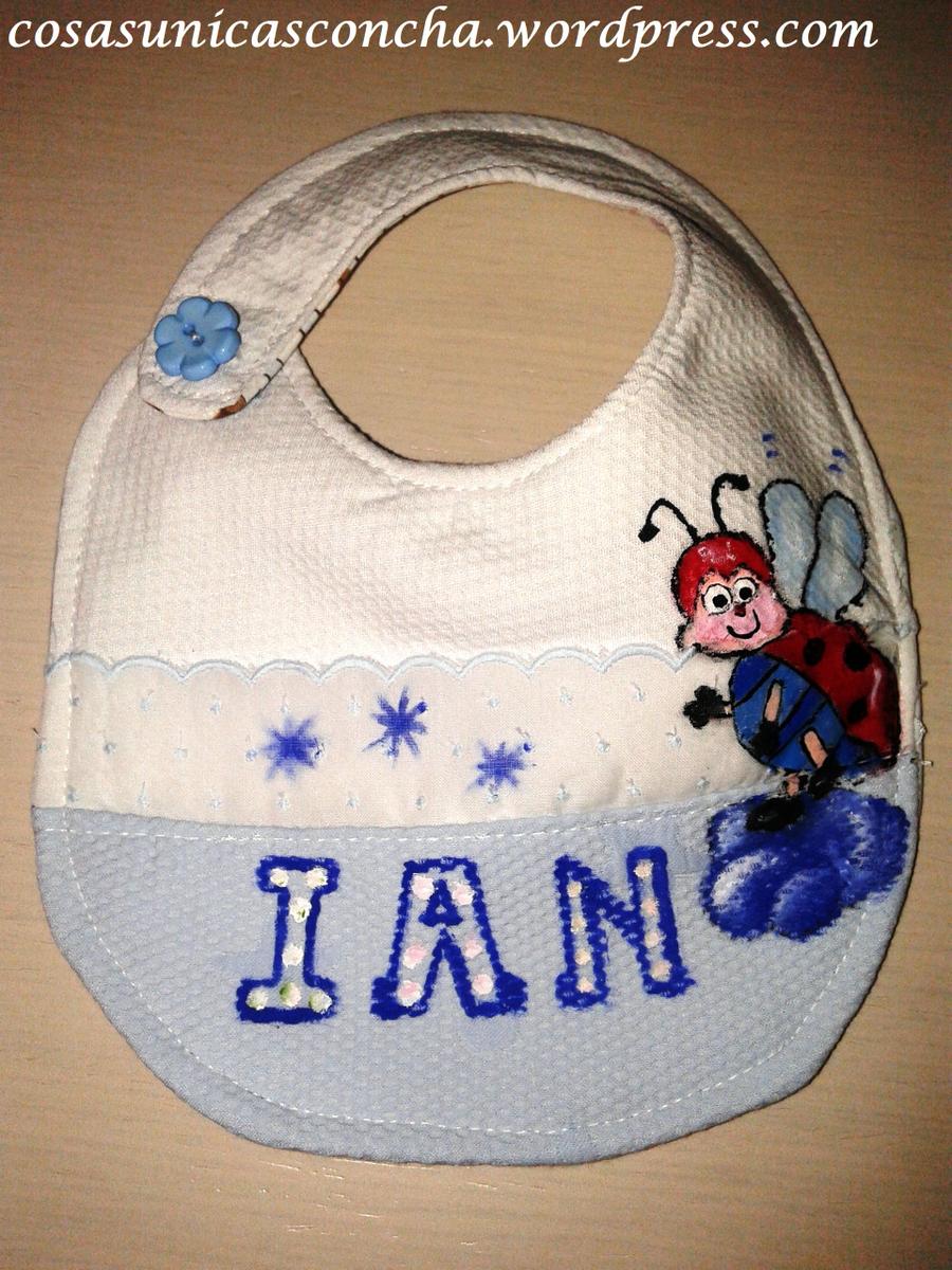 R. 072 Babero reversible personalizado, con bolsillo para guardar el chupete