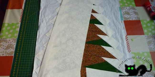 Así colocamos los laterales de tela de fondo