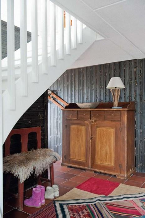 Casas con encanto un refugio revestido en madera con toques étnicos 6