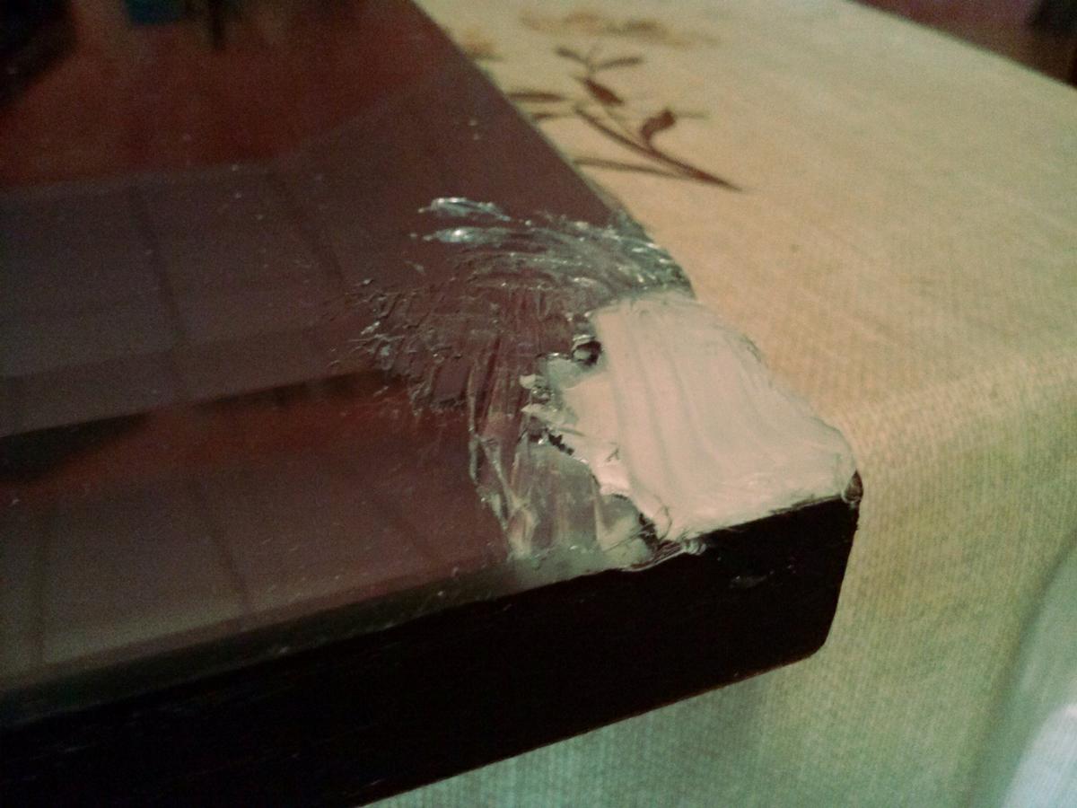 Espejo con marco de cuerda (esquina inferior derecha)