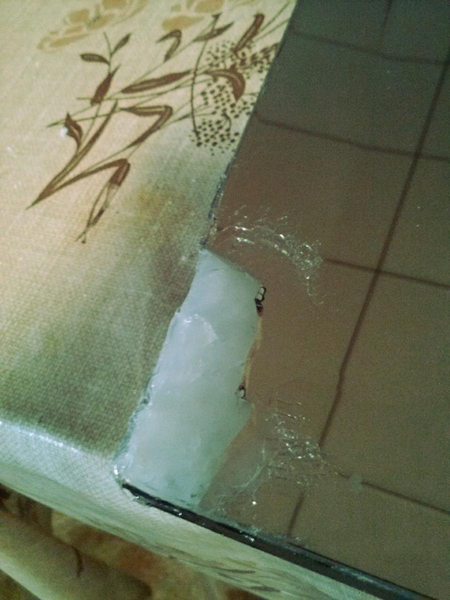 Espejo con marco de cuerda (esquina inferior izquierda)