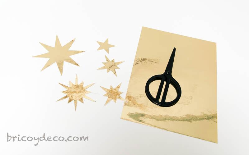 calcar y cortar las estrellas de vinilo