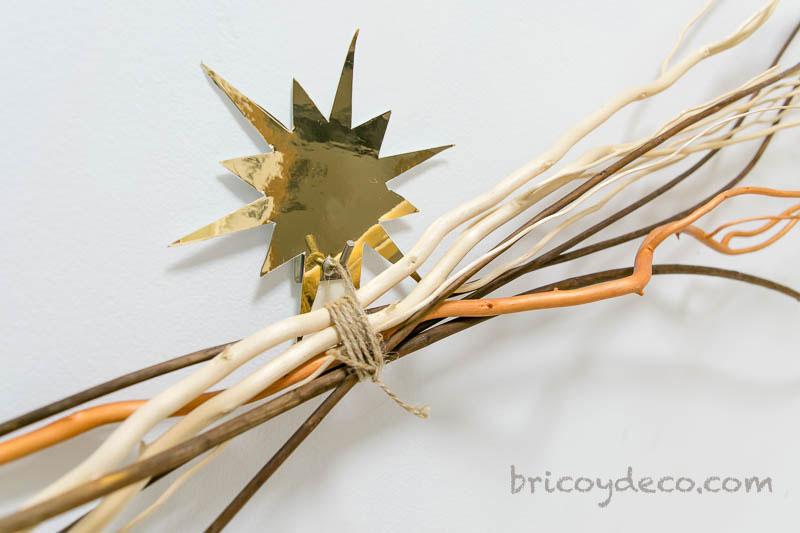 decorar el colgador con una estrella de vinilo