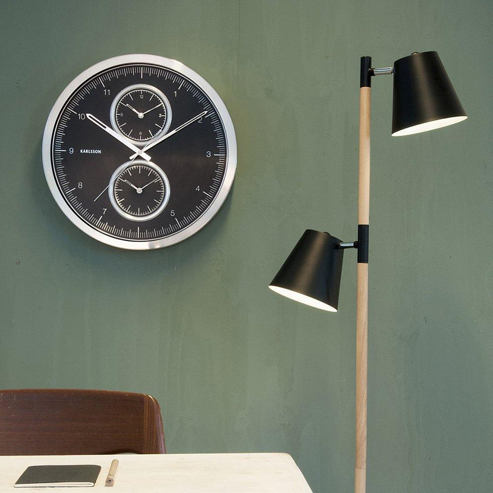 The sleek aluminium World Clock Multiple Time with black dial by Dutch company Karlsson is styled in a precision design like an oversized cronograh with a diameter of 50 cm (!). The clock allows you to keep track with various time zones. A main dial shows you the time for your home zone and smaller dials can be set for two further time zones of your choice. All three movements are silent sweep clockworks to ensure you are not disturbed by any unwanted noise.