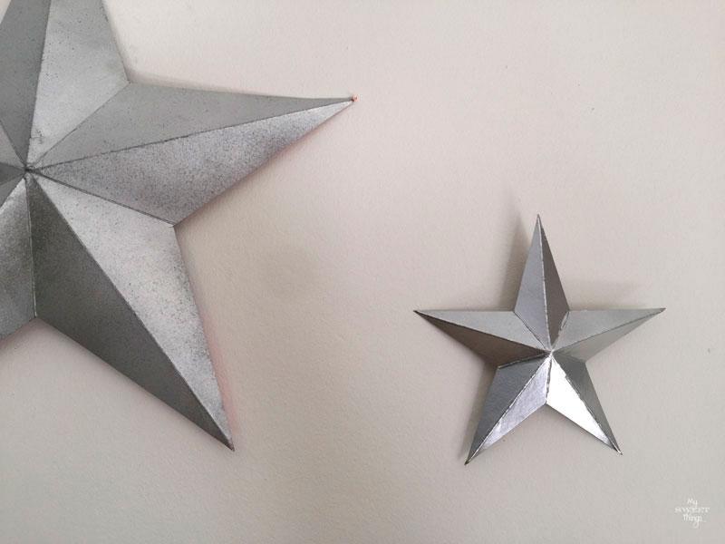 Tutorial on how to make faux metal stars out of common household items and silver spray paint