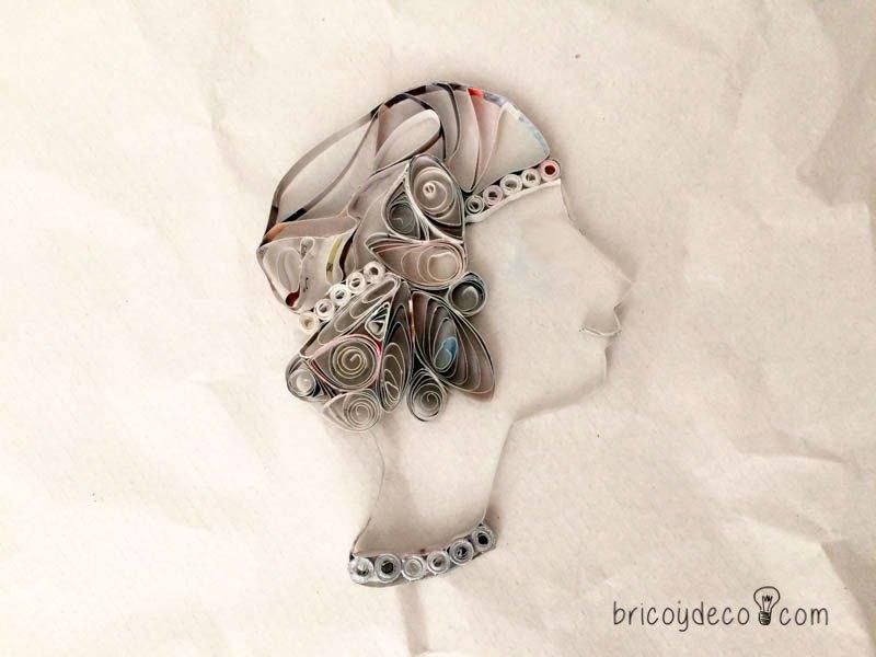 figura quilling con páginas de revistas