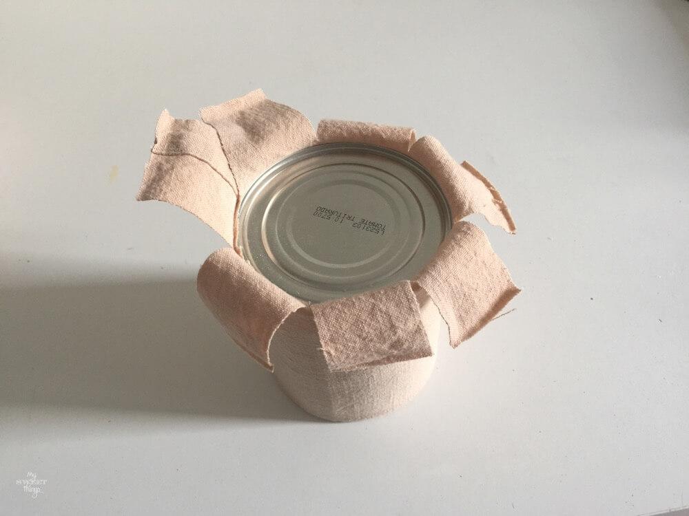 Fabric wrapped tins to get some pretty vases, and easy and cheap DIY