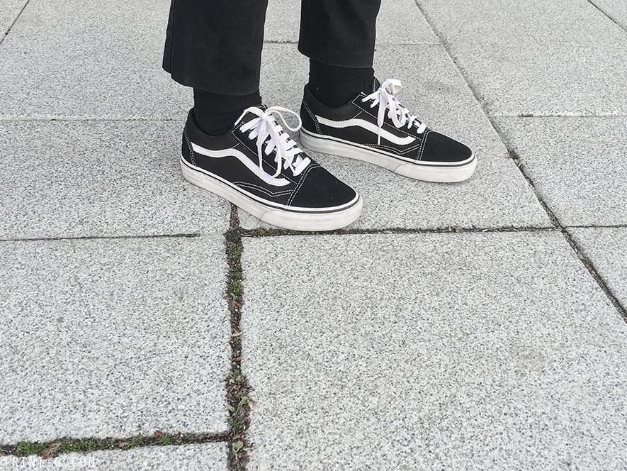 Trini | Claudie Pierlot black coat Vans old school sneakers