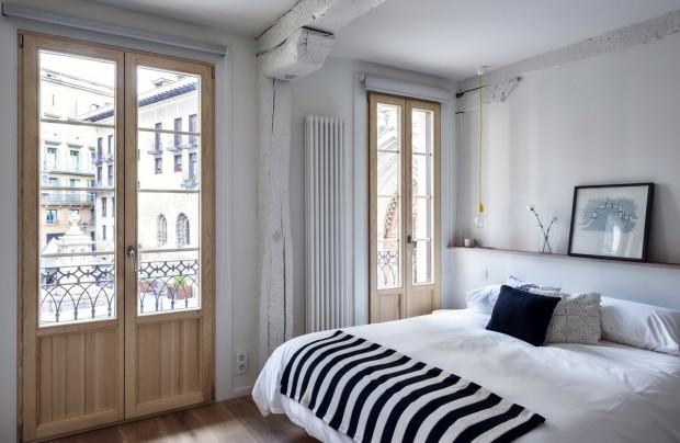 dormitorio con bombilla colgante