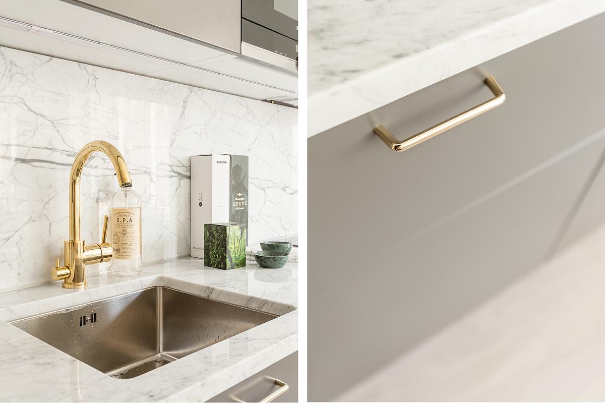 Detalles de los acabados de la cocina de un piso pequeño