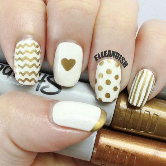 uñas doradas sharpie