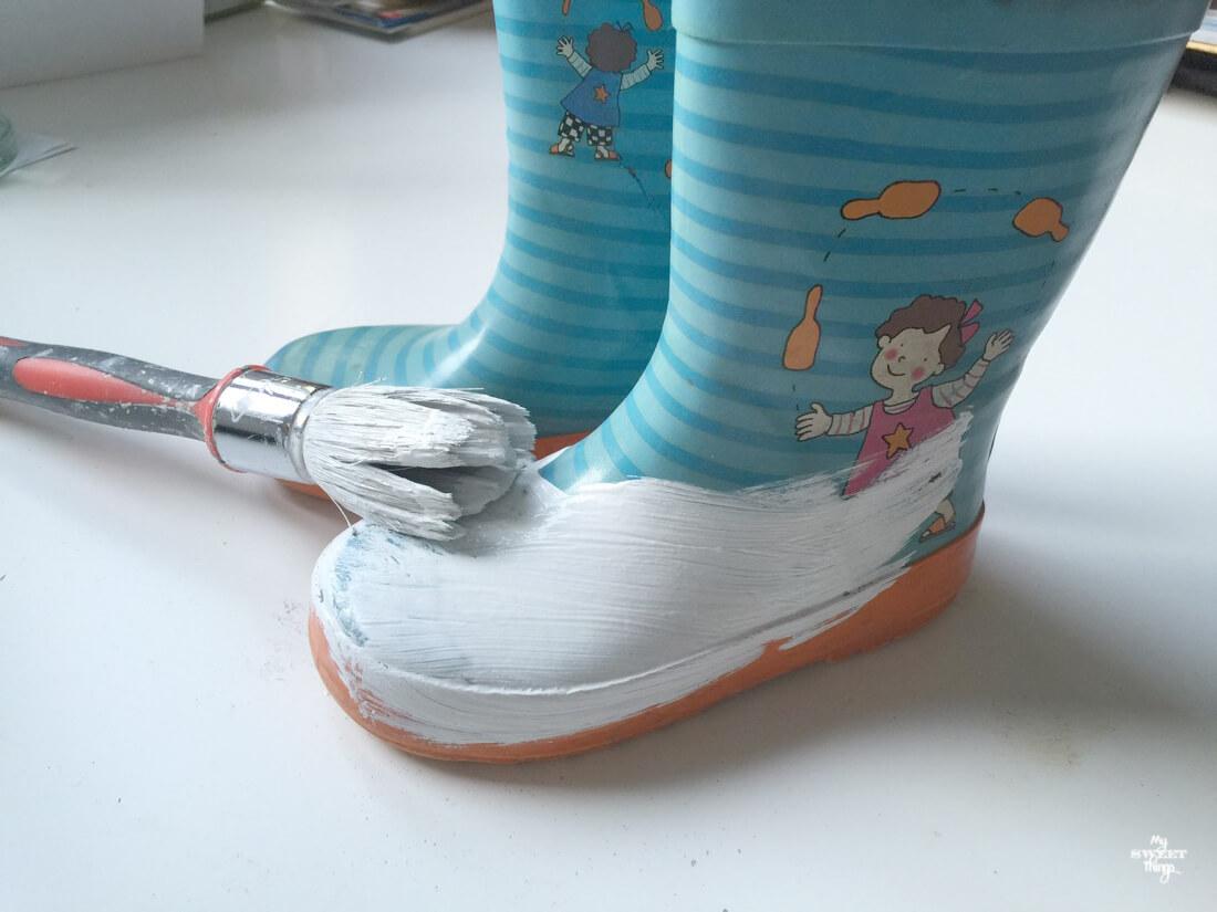 How to make some flower vases out of a pair of old rain boots