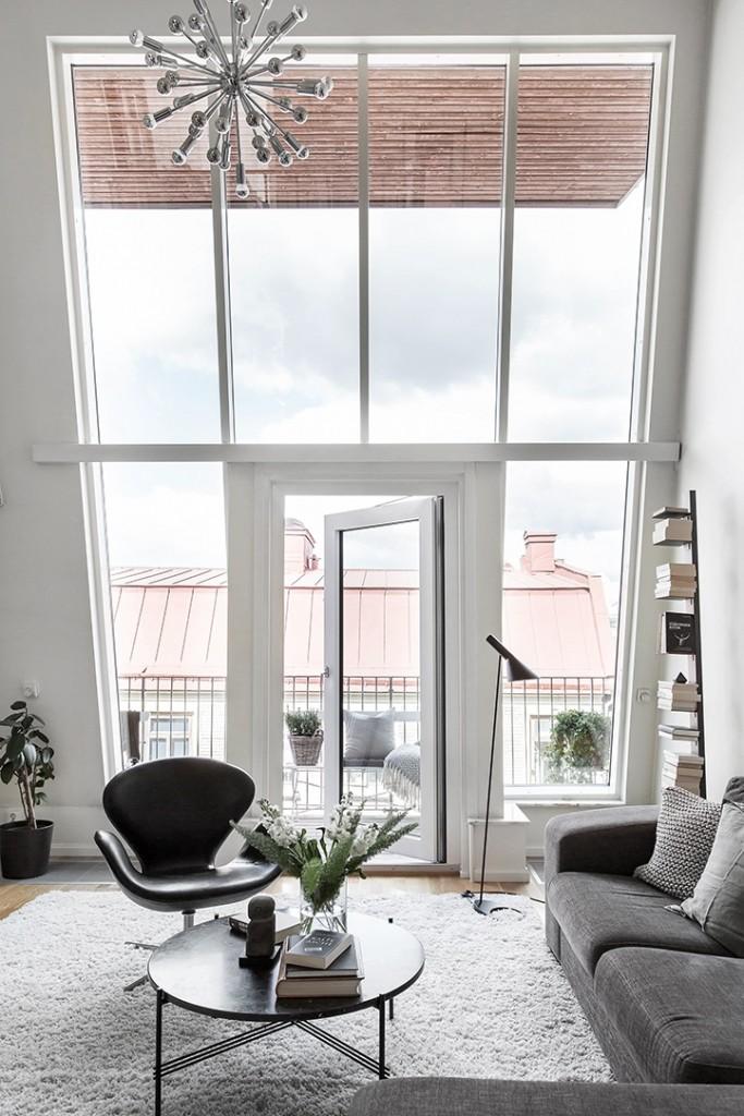 Piso de estilo nórdico con luz natural