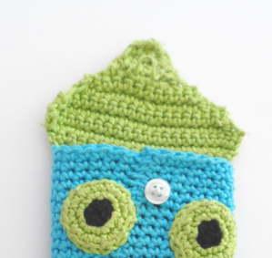 funda de móvil a ganchillo botón