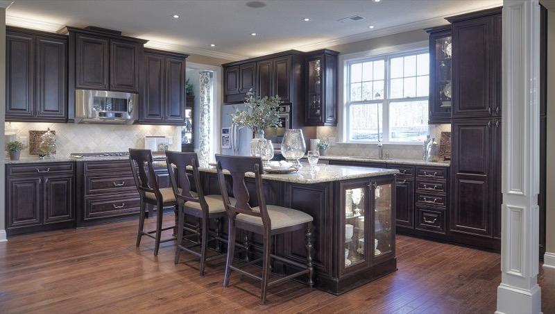 Traditional kitchen with granite countertops black wood cabinets | My Sweet Things