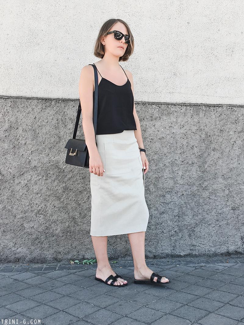 Trini | Acne Studios skirt Hermes Oran sandals