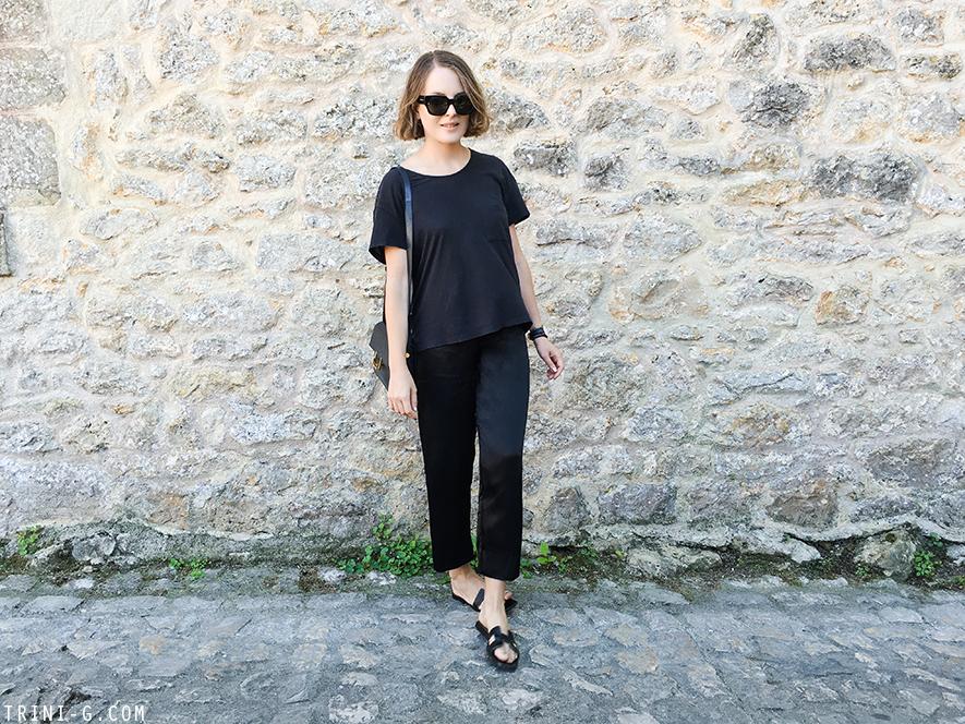 Trini | Acne Studios t-shirt Reformation pants Hermes Oran sandals