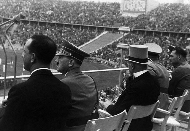 Adolf Hitler and the Crown Prince of Italy attend the Berlin Olympics in 1936. 1936 Berlin, Germany