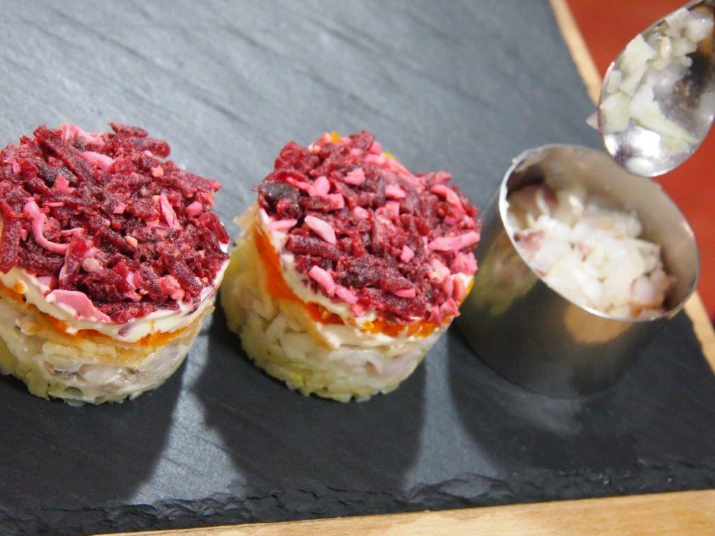 arenque en abrigo empñatado individual