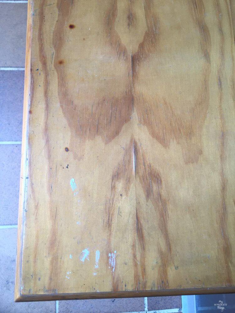 Transform furniture with decoupage and milk paint - A before shot of a nightstand with damaged veneer