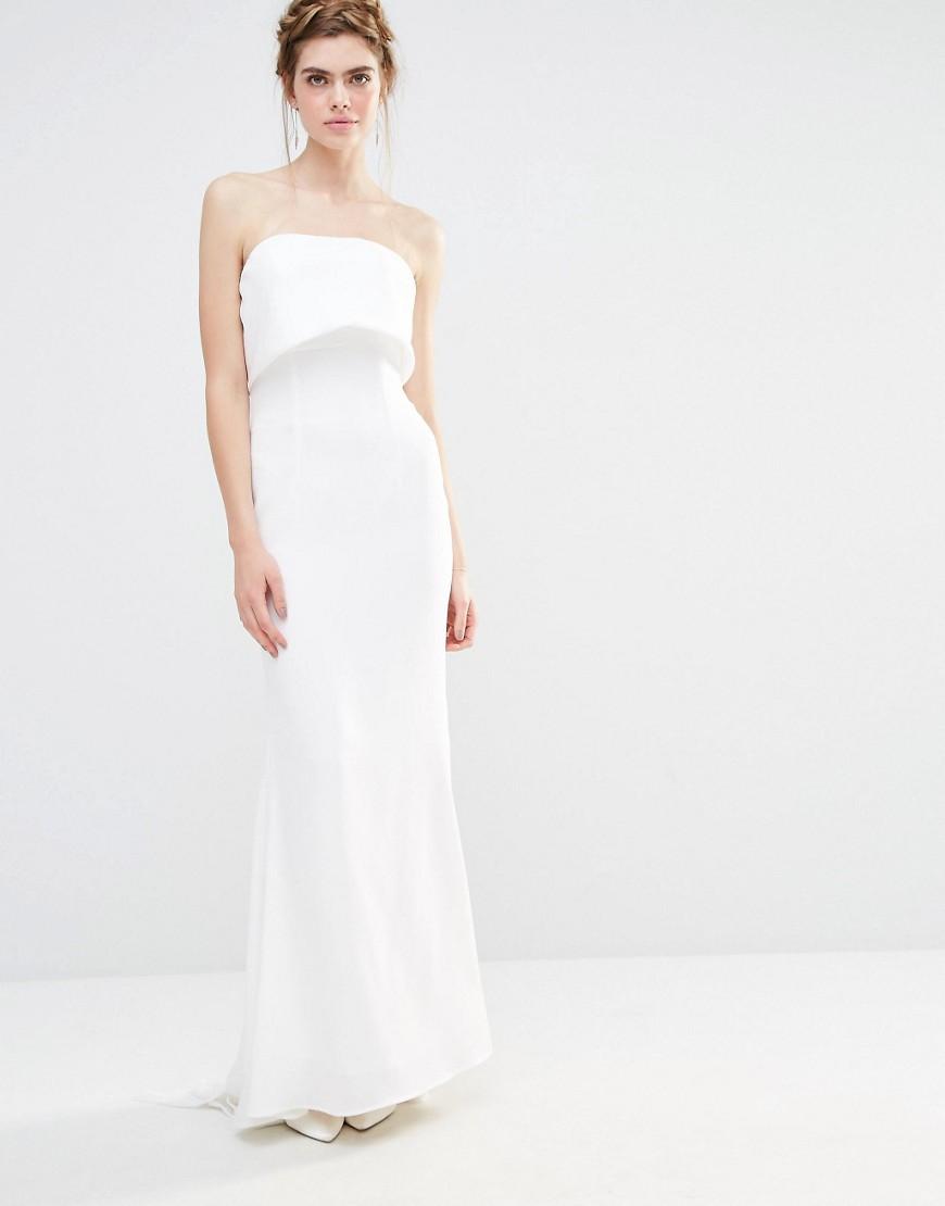 Vestido largo de boda con capa superpuesta y diseño con cola de pez y lazo extragrande parte posterior de Jarlo 139.99€