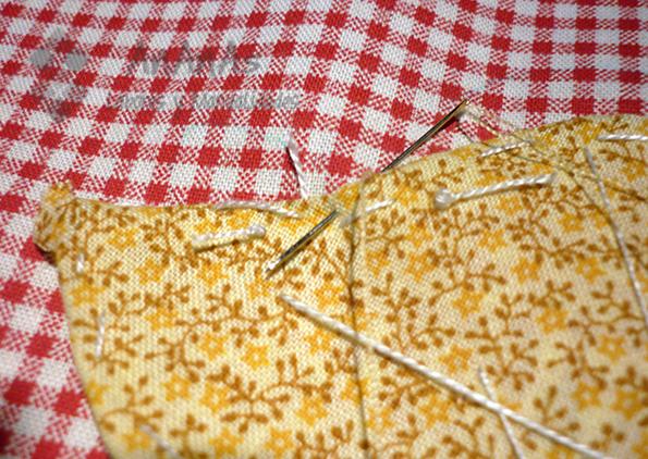 sunbonnet-sue-clavar-la-aguja-mas-adentro-en-los-cortes