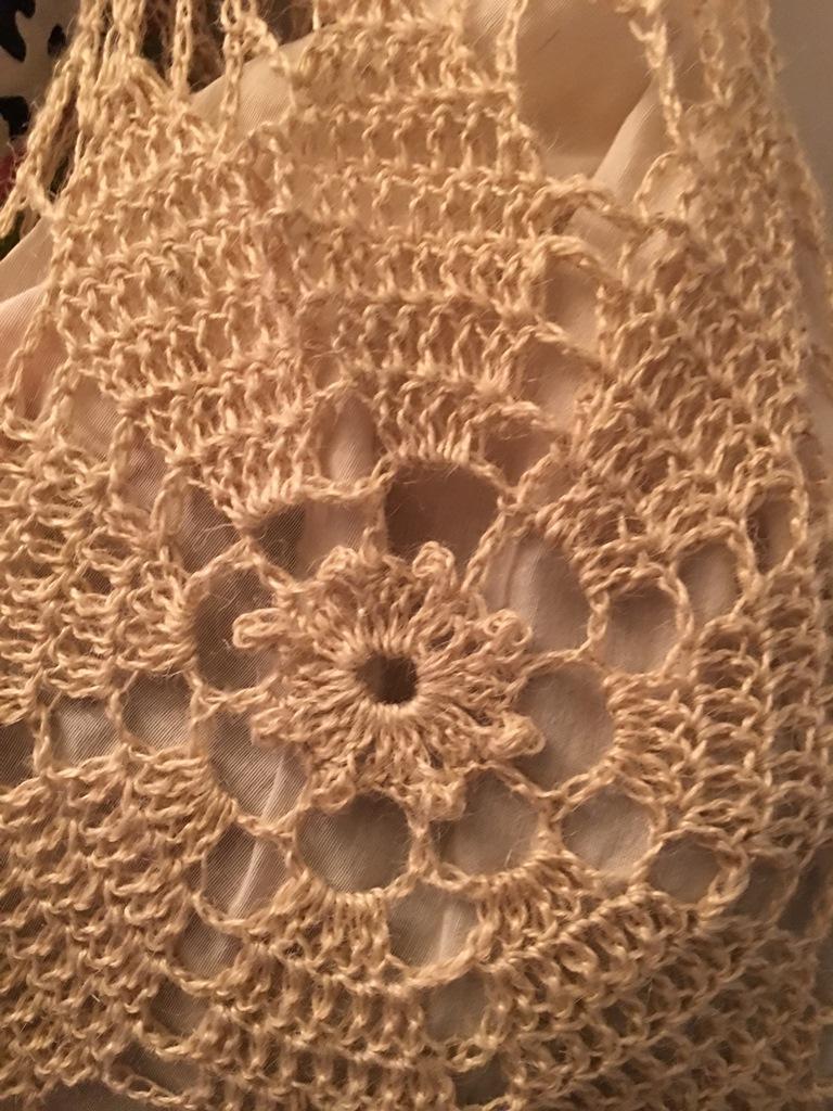 Detalle del centro de la bolsa de mandados