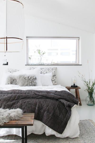Dormitorio con textiles de invierno