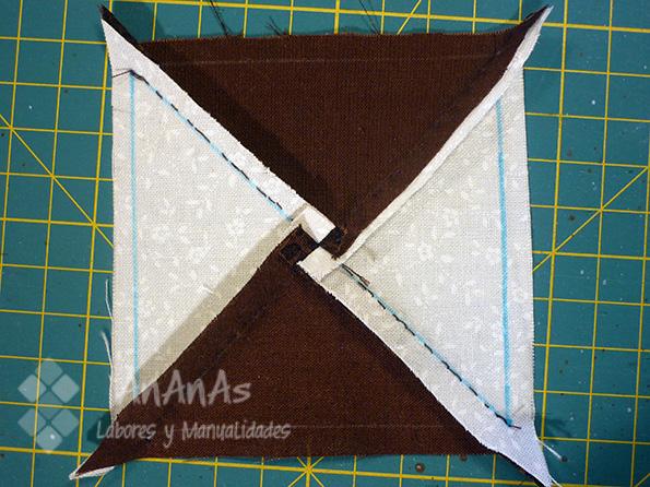 cuadrado-de-cuatro-triangulos-planchado-de-margenes-de-costura