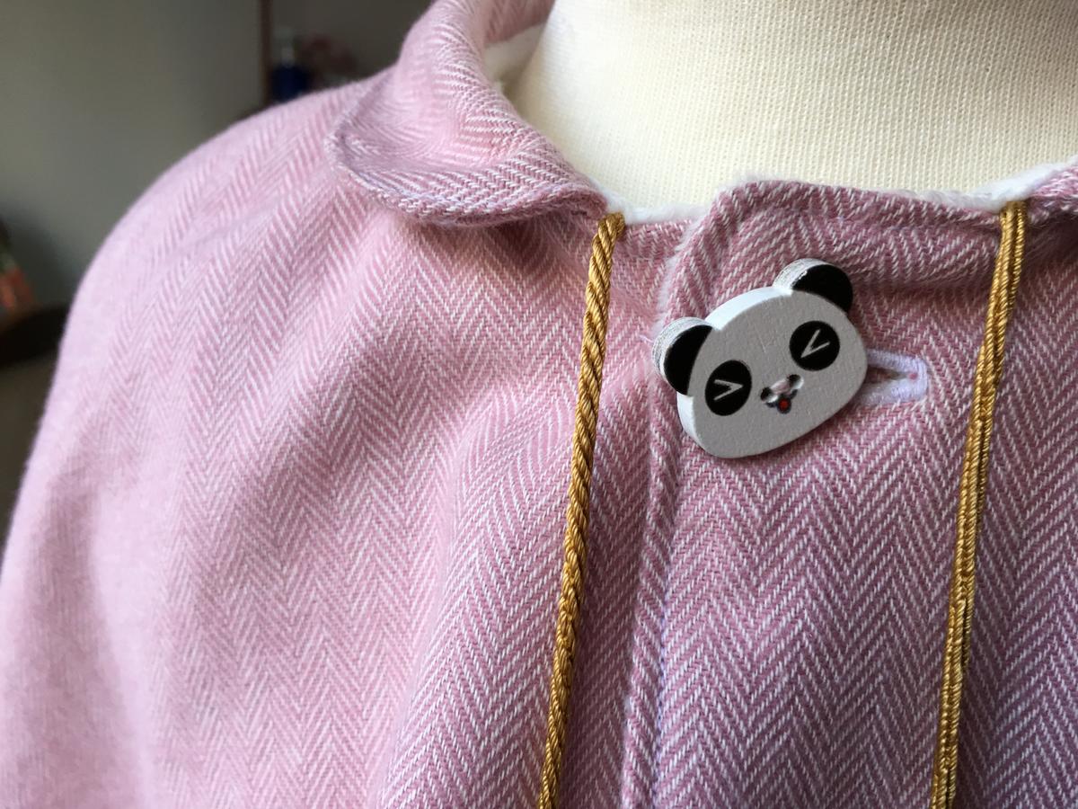 Detalle botón de panda