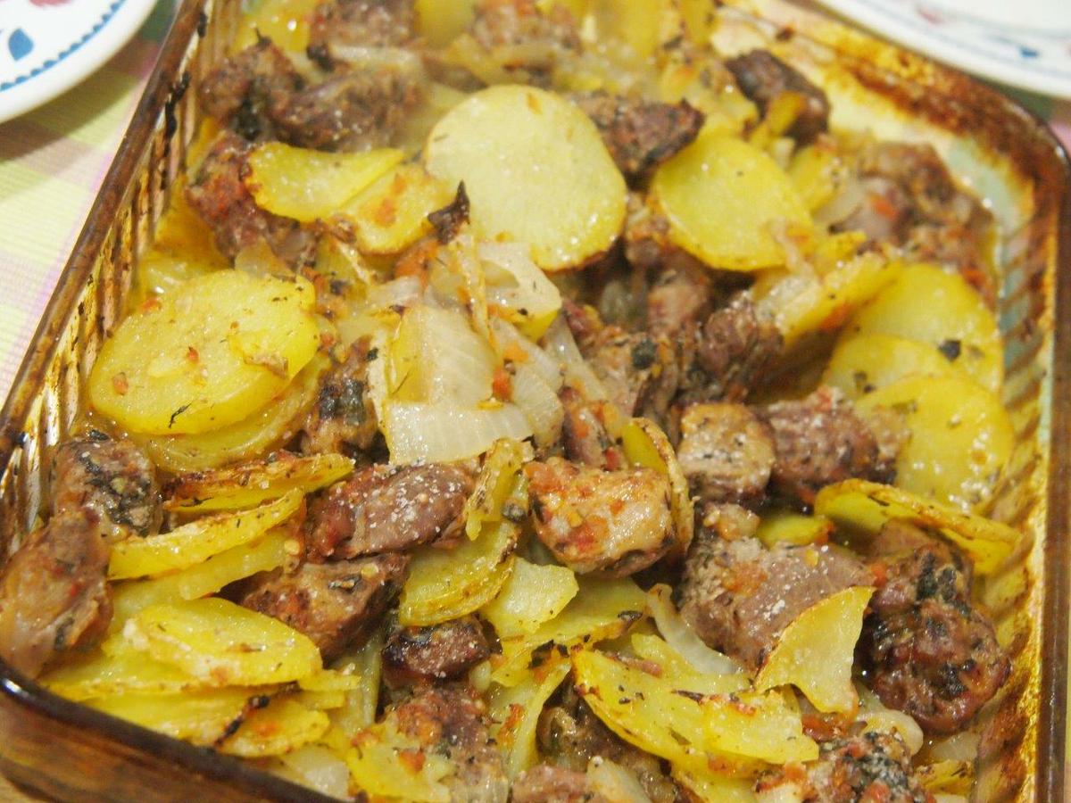 cordero asado con patatas y limón