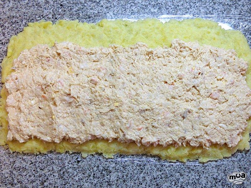 Brazo de patata con rape y merluza
