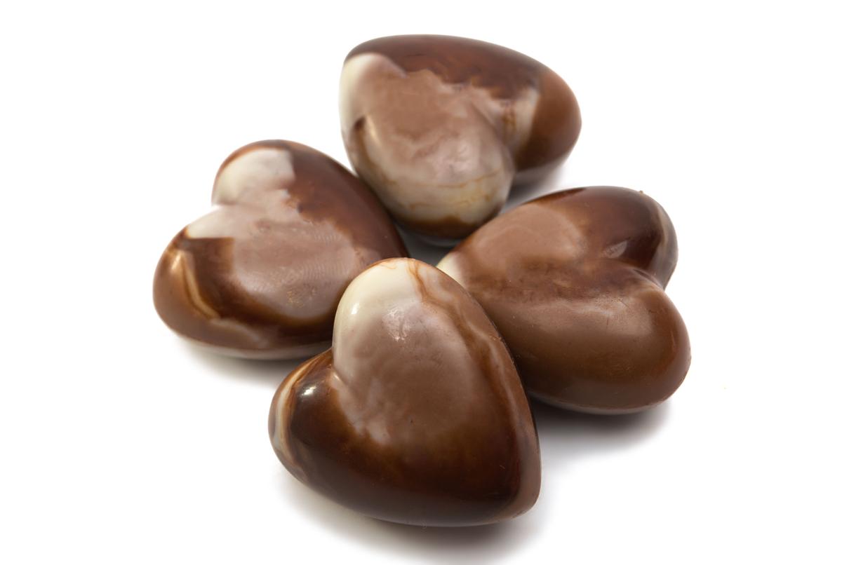 51596293 - belgian chocolate heart on white background