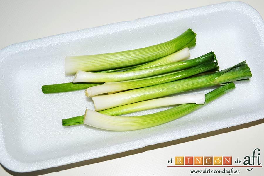 Pisto con bacalao y ajos tiernos, limpiar los ajos tiernos retirando las bases