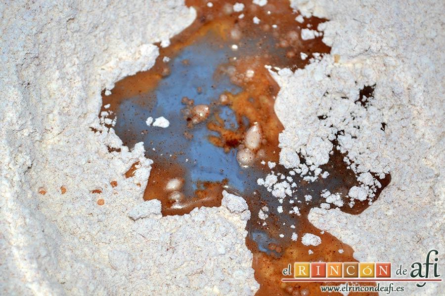 Bacalao rebozado con pimentón, añadir el agua