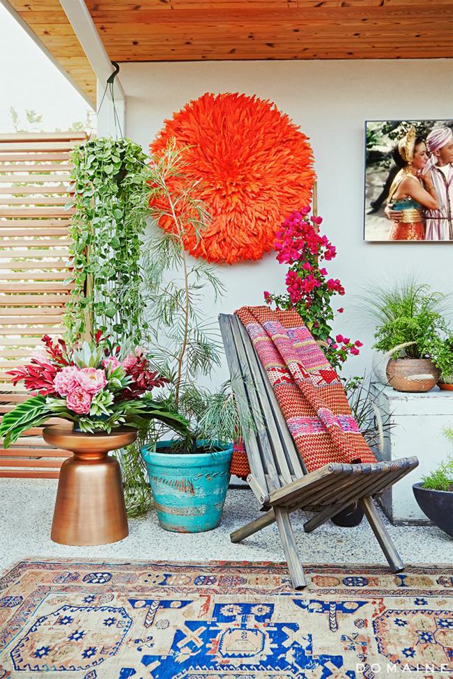 terraza al aire libre estilo boho turquesa y naranja