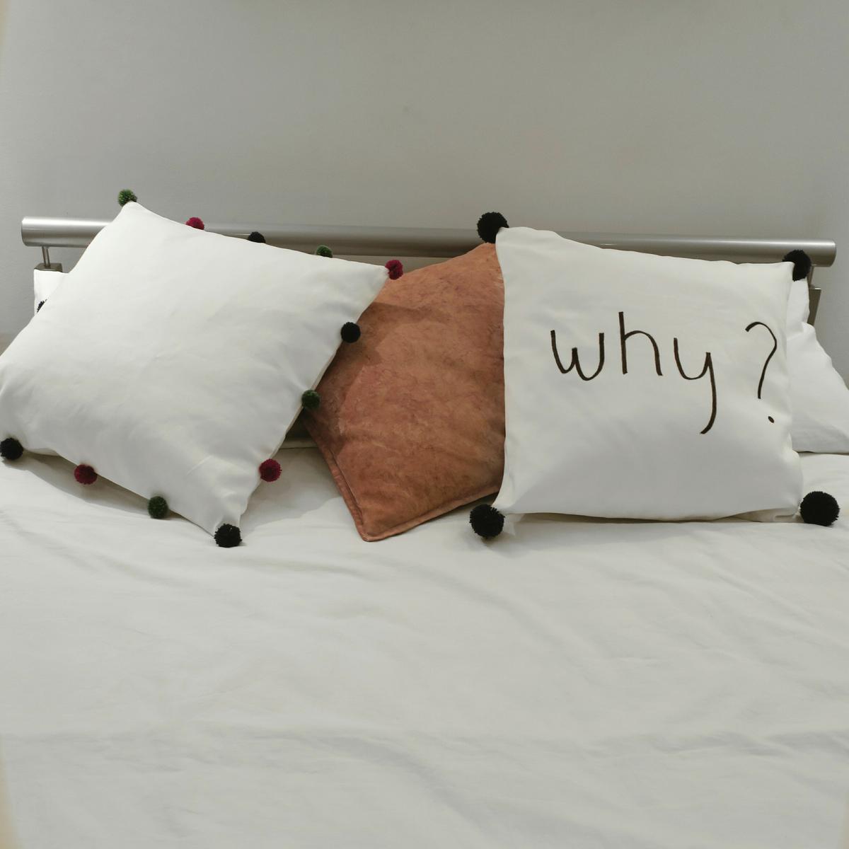 Cojines con pompones