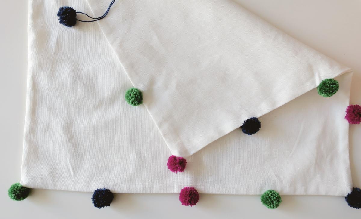 Cojines con pompones