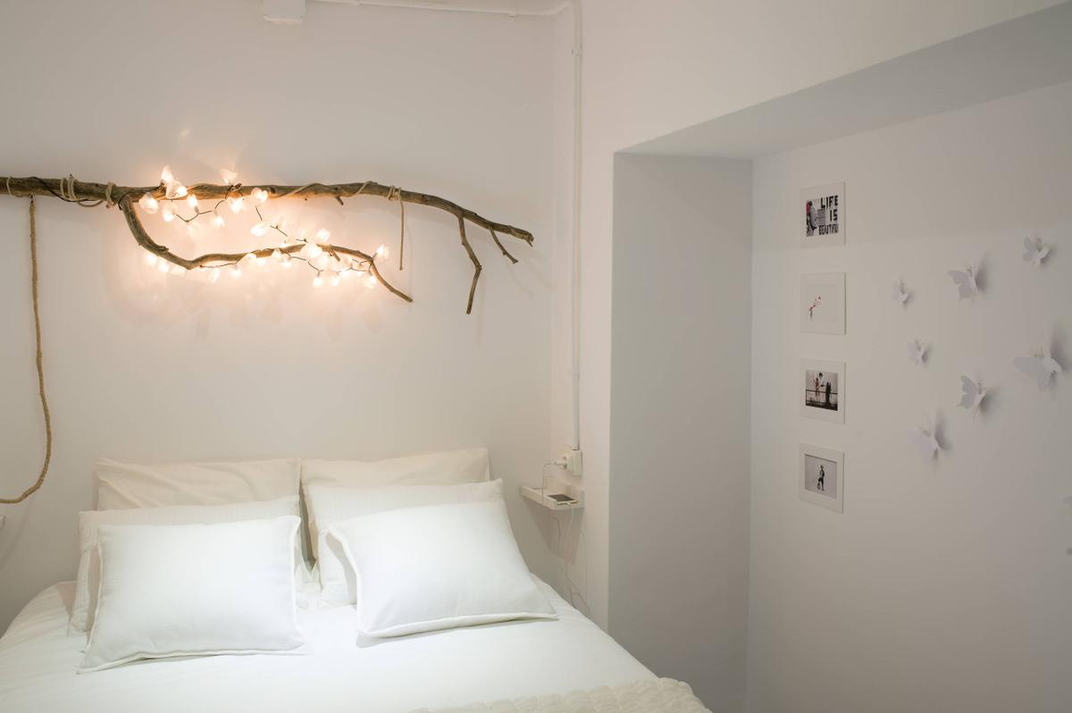 Dormitorio con luces cálidas para dar confort