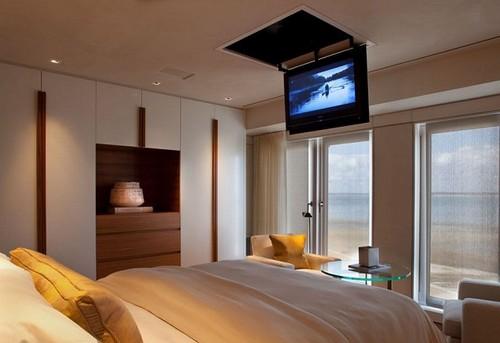 idea para colgar television en cuarto matrimonial