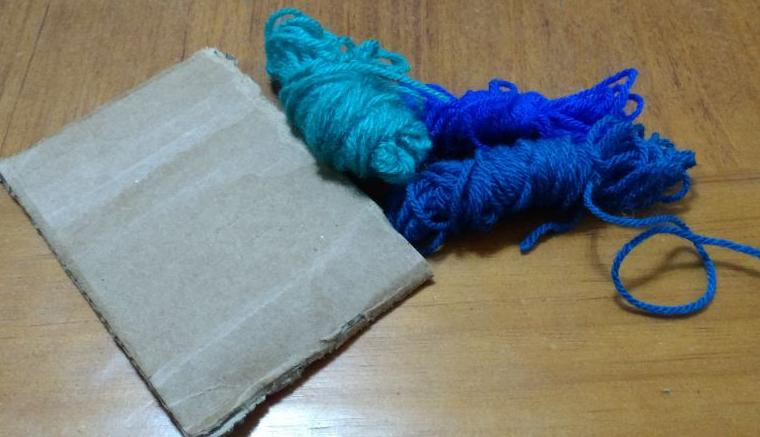 como hacer borlas de lana