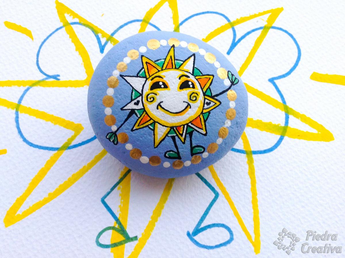 Sol en piedra pintada
