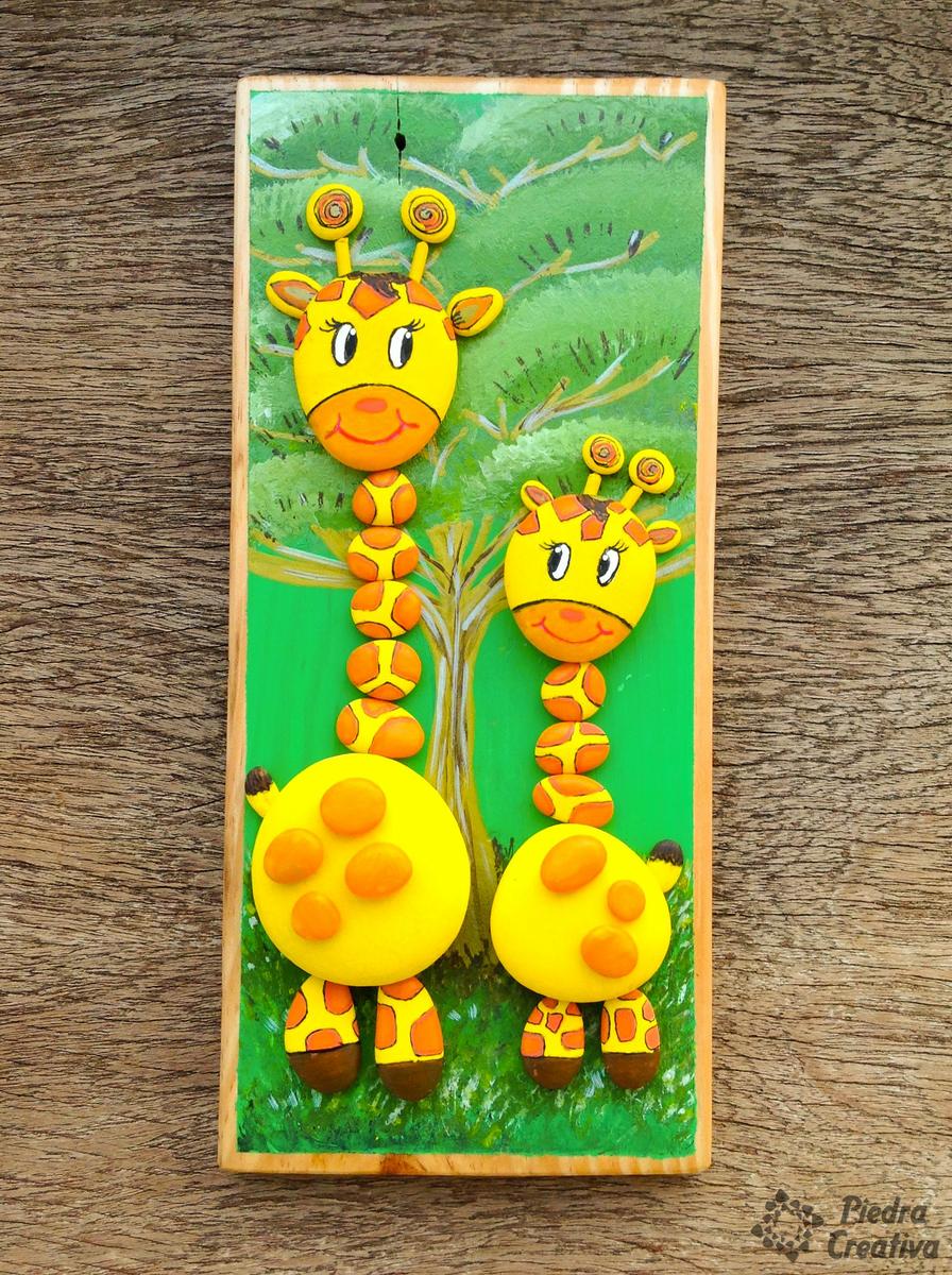 Jirafas pintadas en piedras