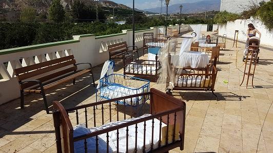 Exposición de cunas antiguas