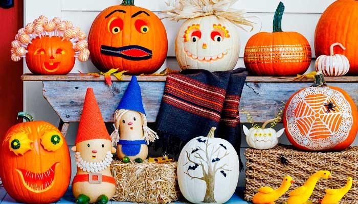 HALLOWEEN,-CATRINAS,-BRUJAS,-FANTASMAS,-calabazas-decoradas-con-diversas-caras