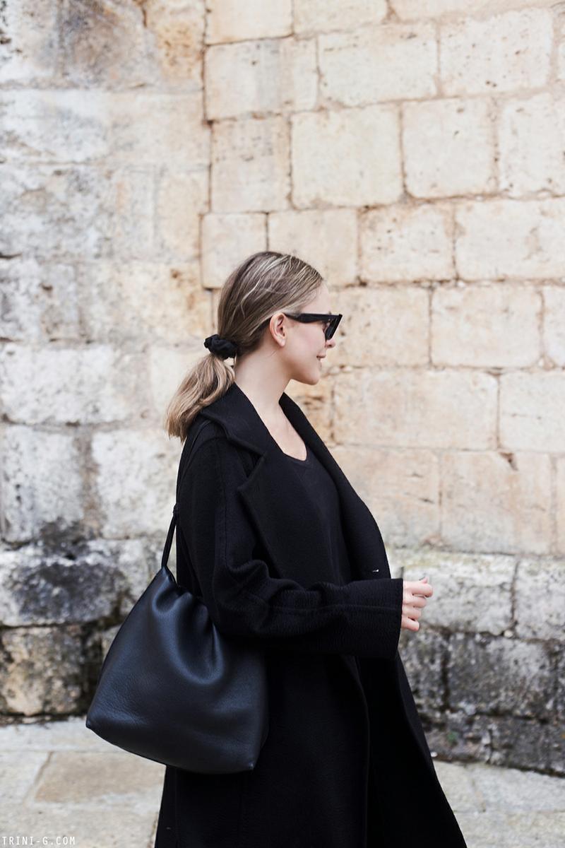 Trini | MaxMara Manuela coat The Row bag Céline Bam Bam ankle boots